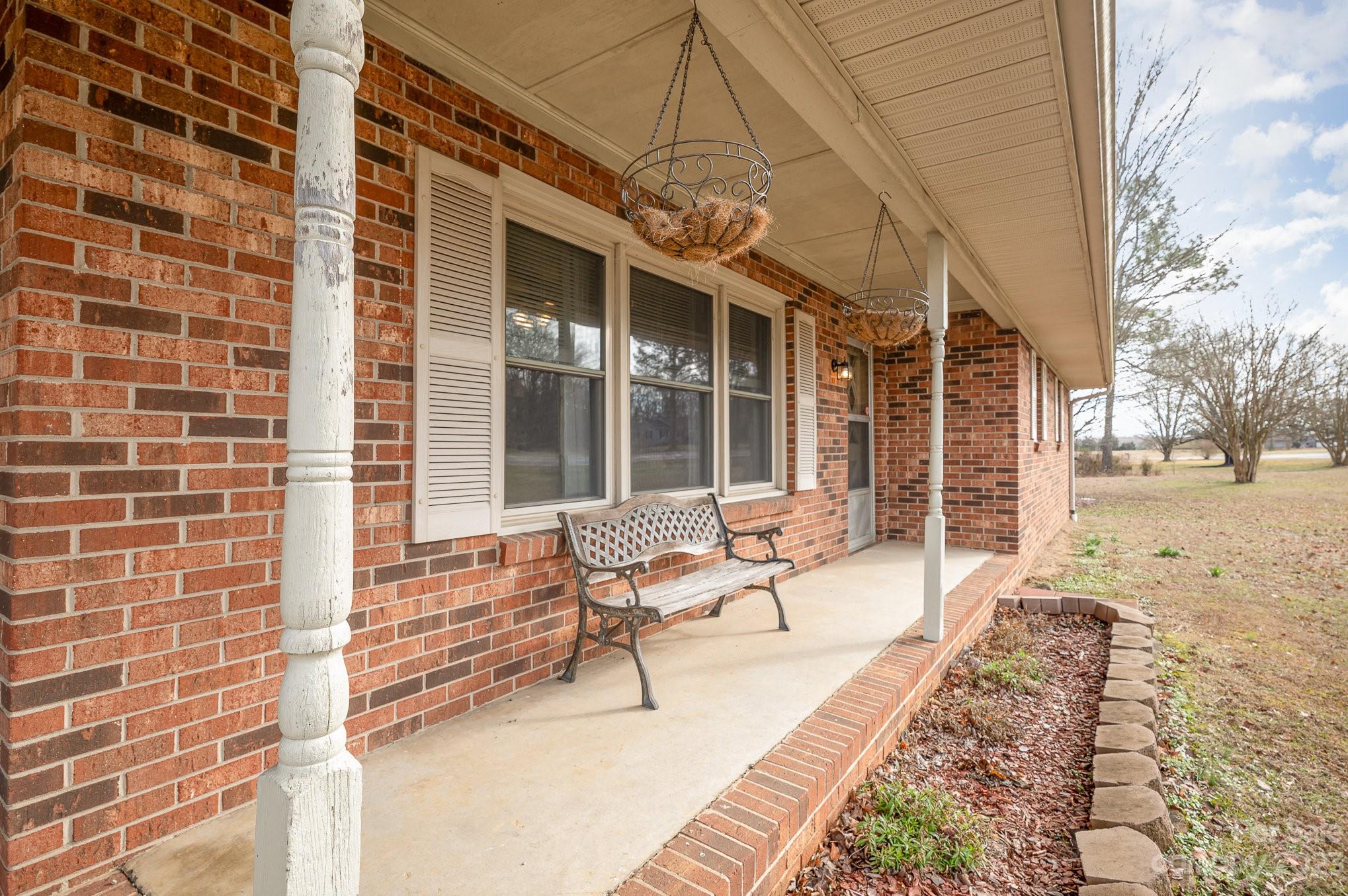 835 Parks Road Woodleaf, NC 27054 - Photo 4 of 28 a building outdoor space with seating space