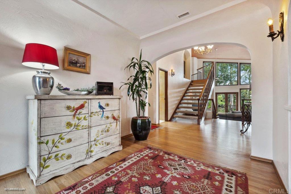 1085 Meade Avenue San Diego, CA 92116 - Photo 6 of 6 a living room with furniture and wooden floor