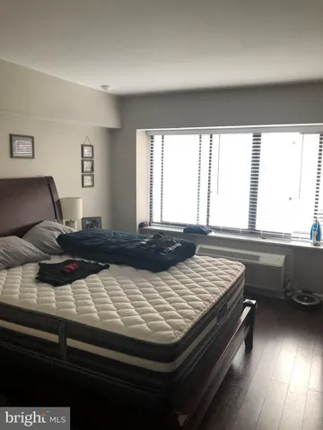 a kitchen with a stove and a window