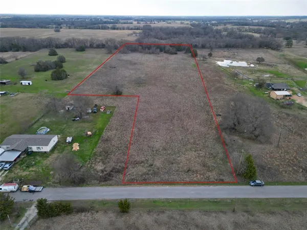 a view of a road with an outdoor space