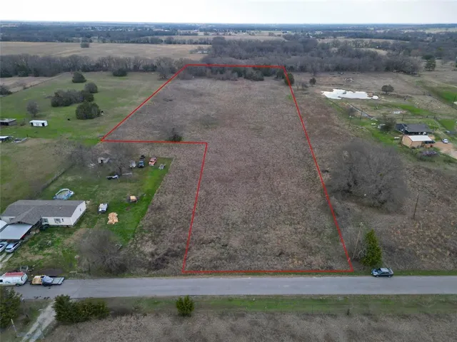 a view of a road with an outdoor space