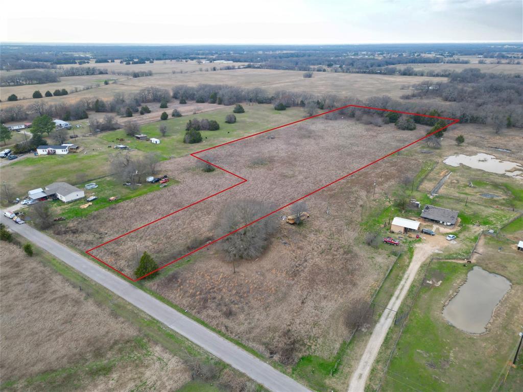 Lot 9 Acorn Circle Scurry, TX 75158 - Photo 4 of 9 a view of a dry yard with wooden fence