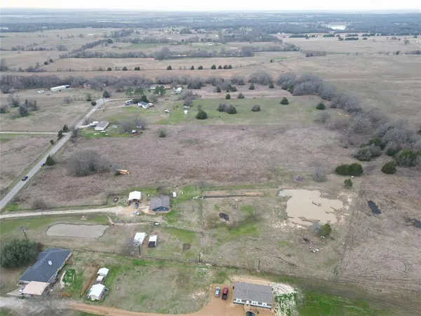 an aerial view of house with outdoor space