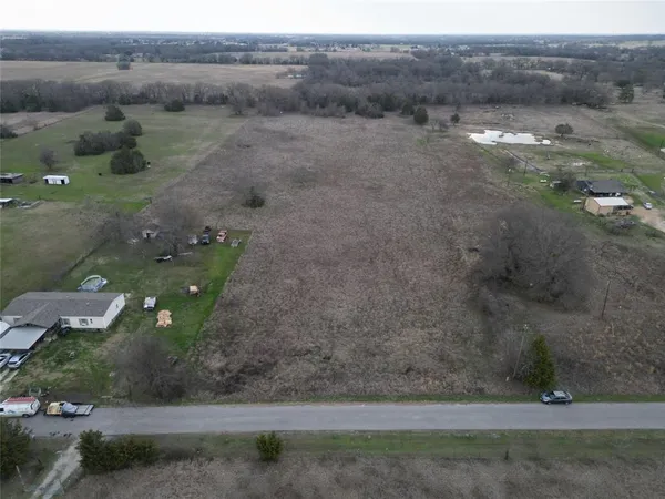 a view of a yard with green space