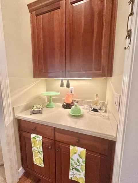 104 Willow Overlook Canton, GA 30115 - Photo 8 of 27 a kitchen with a sink a cabinets and wooden floor