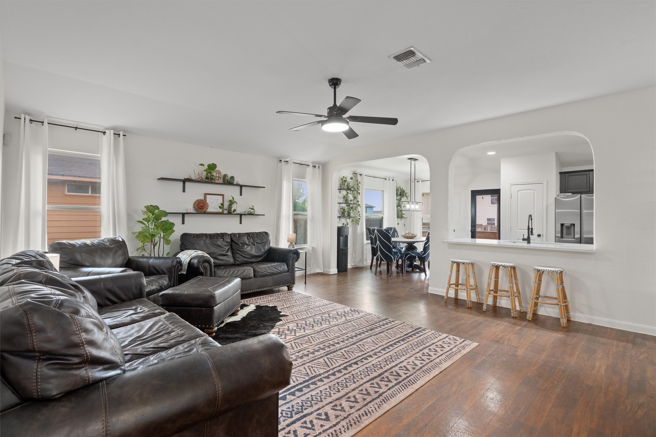 606 Old Peak Road Georgetown, TX 78626 - Photo 4 of 23 a living room with furniture and a wooden floor