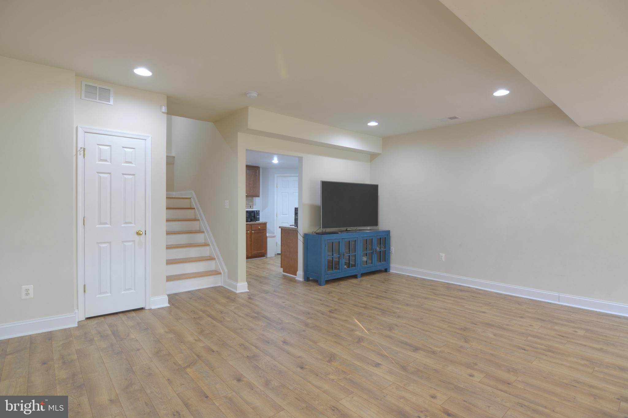 1506 Rising Ridge Road Mount Airy, MD 21771 - Photo 75 of 84 Fully Finished Basement with Hardwood Floor