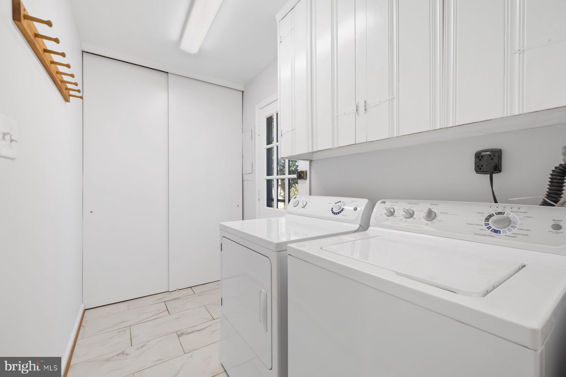 13817 Blair Stone Lane Silver Spring, MD 20906 - Photo 18 of 53 Convenient laundry room between garage & kitchen