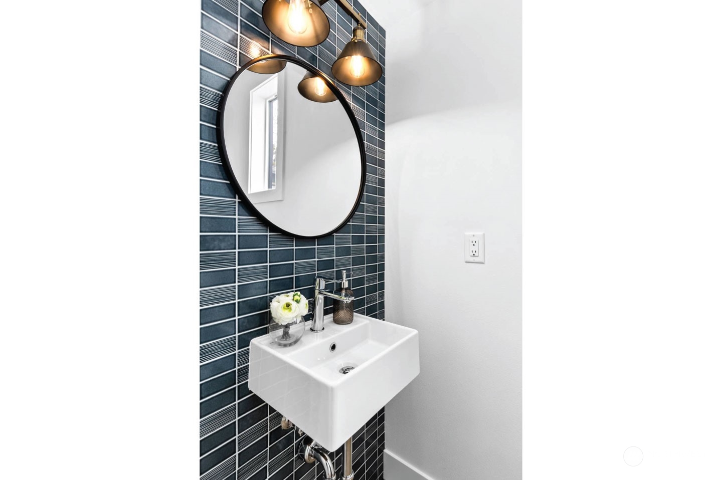 533 North 71st Street, Unit B Seattle, WA 98103 - Photo 11 of 23 a bathroom with a sink a light fixture and a mirror