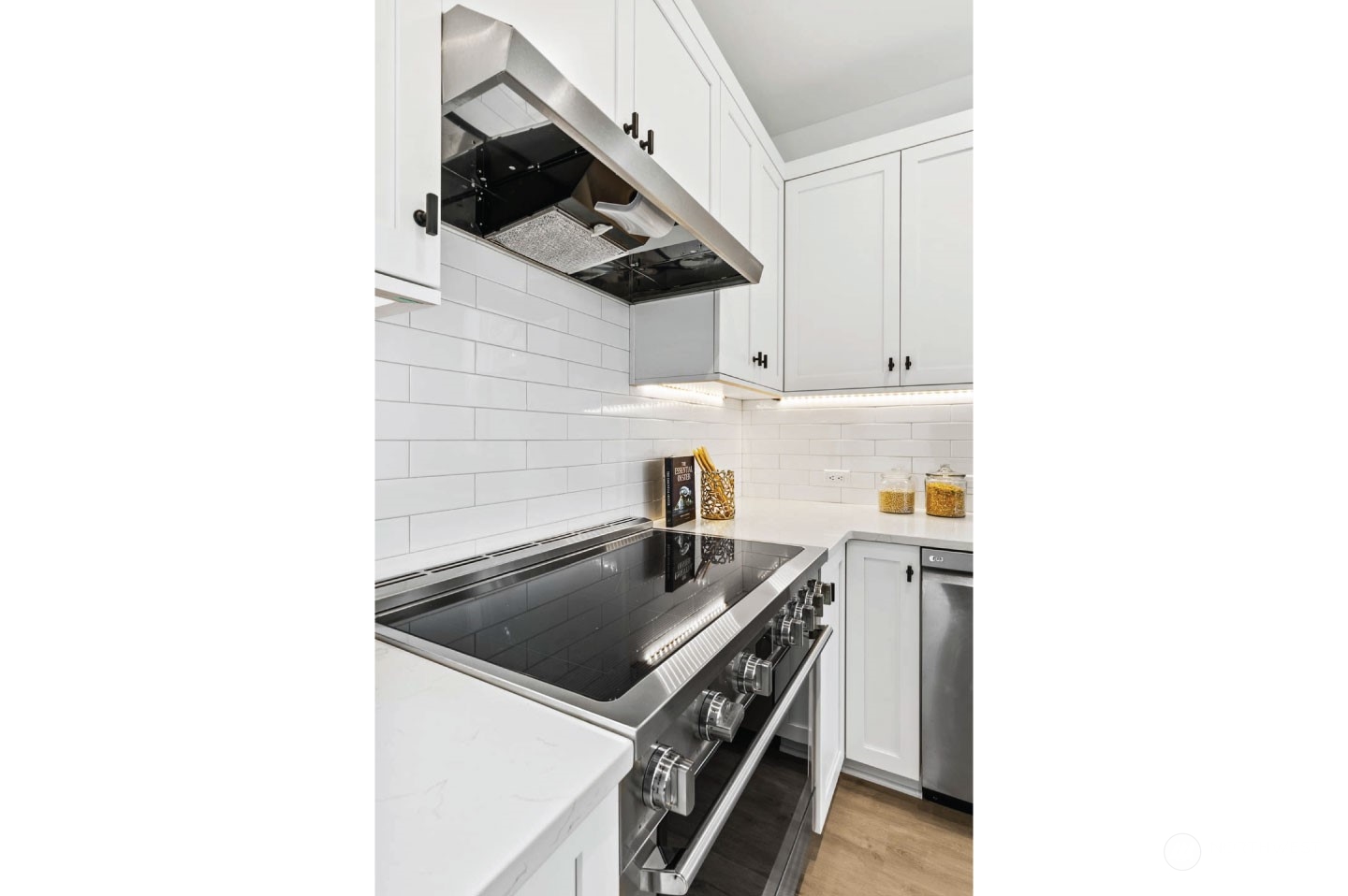533 North 71st Street, Unit B Seattle, WA 98103 - Photo 13 of 23 a kitchen with stainless steel appliances a sink a stove and a microwave