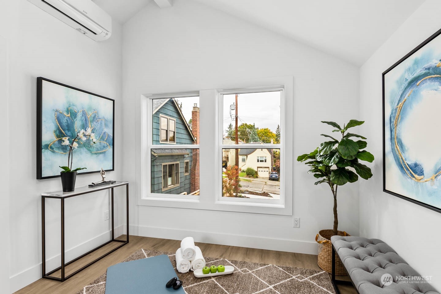 533 North 71st Street, Unit B Seattle, WA 98103 - Photo 15 of 23 a vase of flowers sitting on a table next to a window