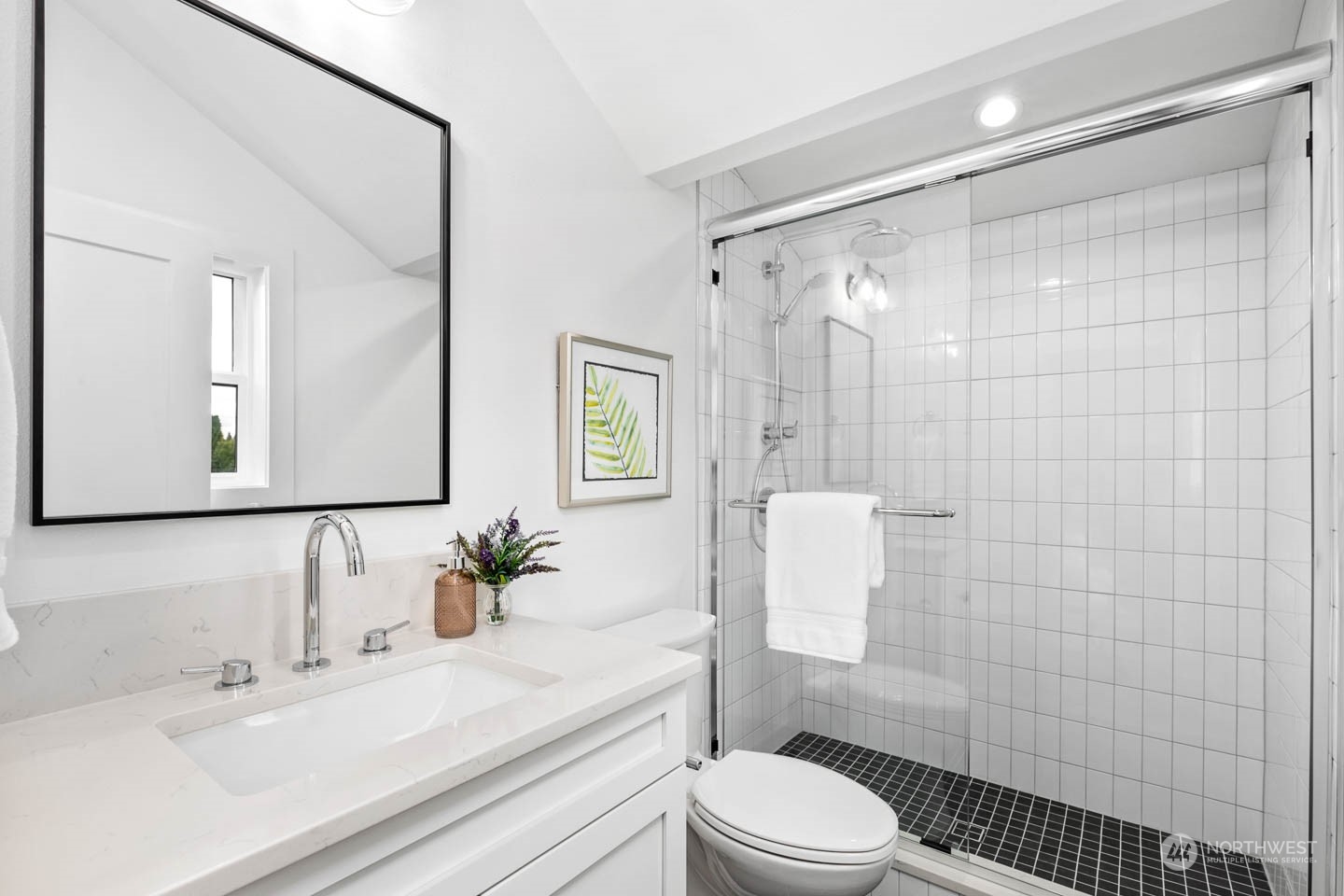 533 North 71st Street, Unit B Seattle, WA 98103 - Photo 20 of 23 a bathroom with a sink a toilet and shower