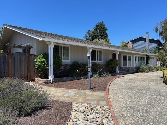 1118 Pinehurst Drive Aptos, CA 95003 - Photo 2 of 23 a front view of a house with garden