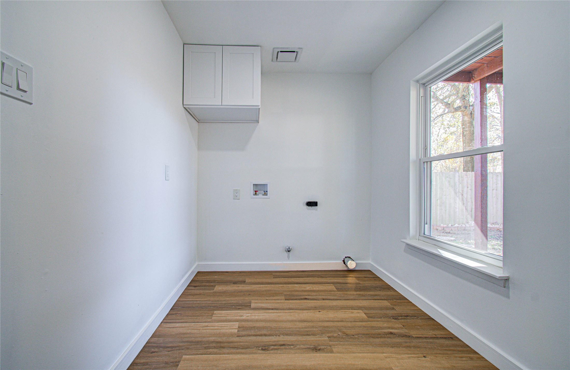 23319 Whispering Willow Drive Spring, TX 77373 - Photo 11 of 41 a view of empty room with wooden floor and fan