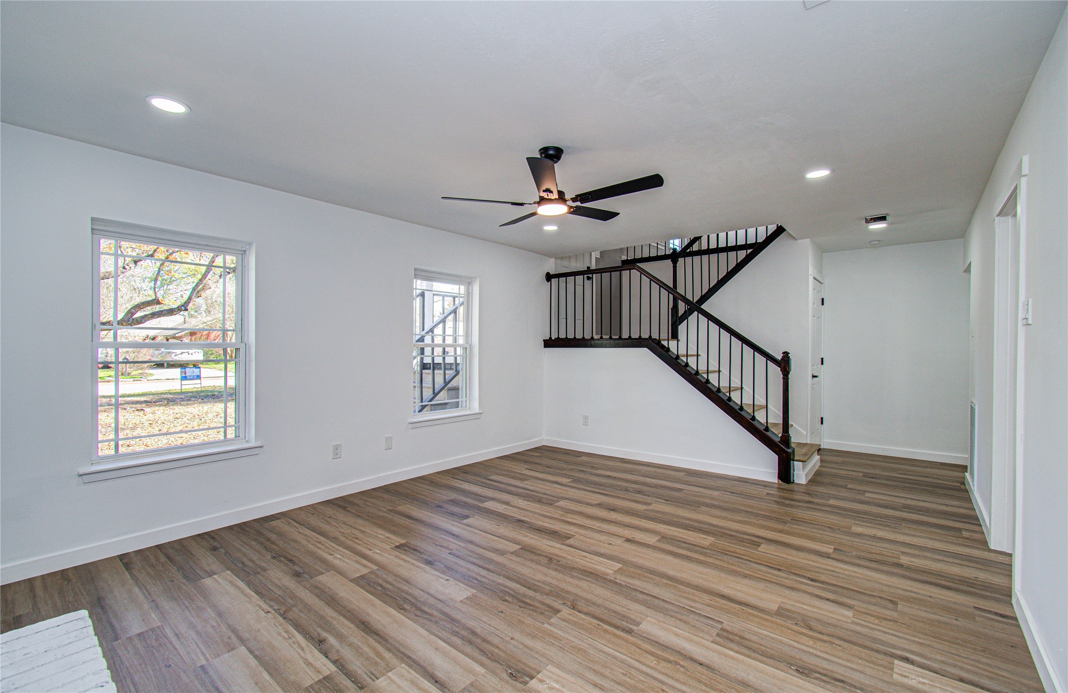23319 Whispering Willow Drive Spring, TX 77373 - Photo 20 of 41 a view of empty room with wooden floor and fan