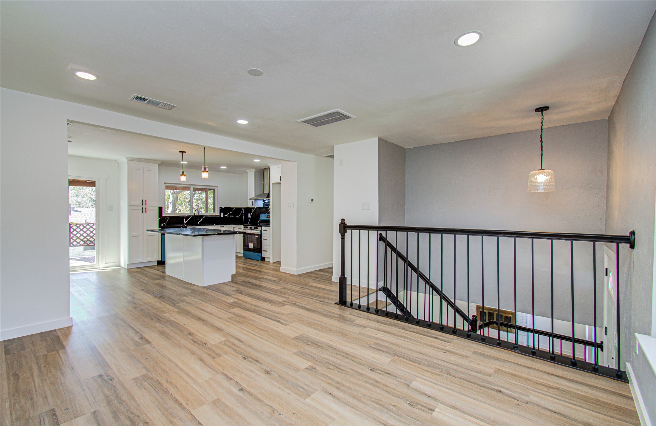 23319 Whispering Willow Drive Spring, TX 77373 - Photo 21 of 41 a view of kitchen dining table chairs microwave and cabinets