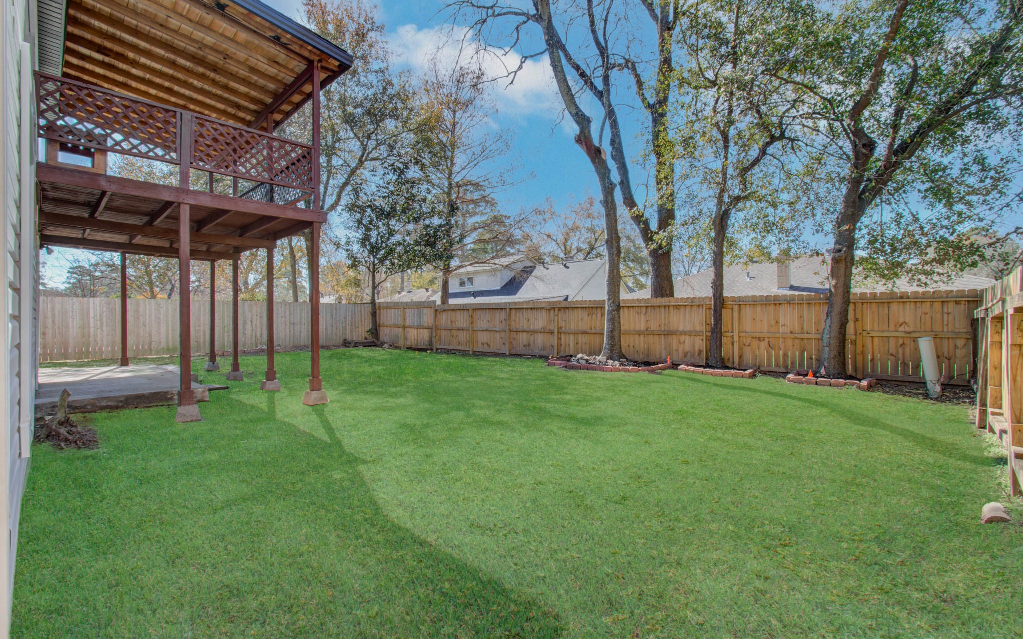 23319 Whispering Willow Drive Spring, TX 77373 - Photo 24 of 41 a view of a backyard with a small cabin