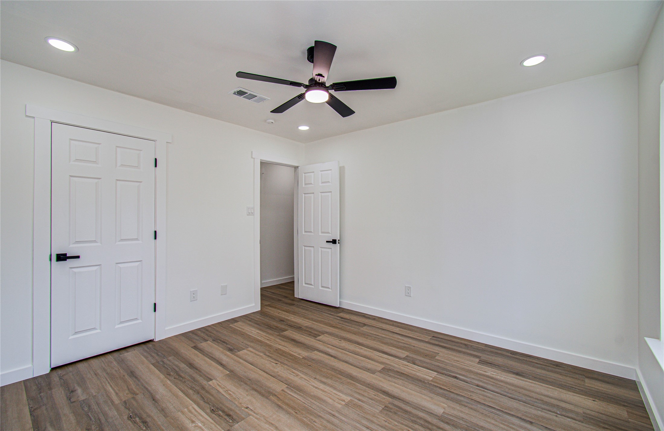 23319 Whispering Willow Drive Spring, TX 77373 - Photo 25 of 41 a view of empty room with wooden floor