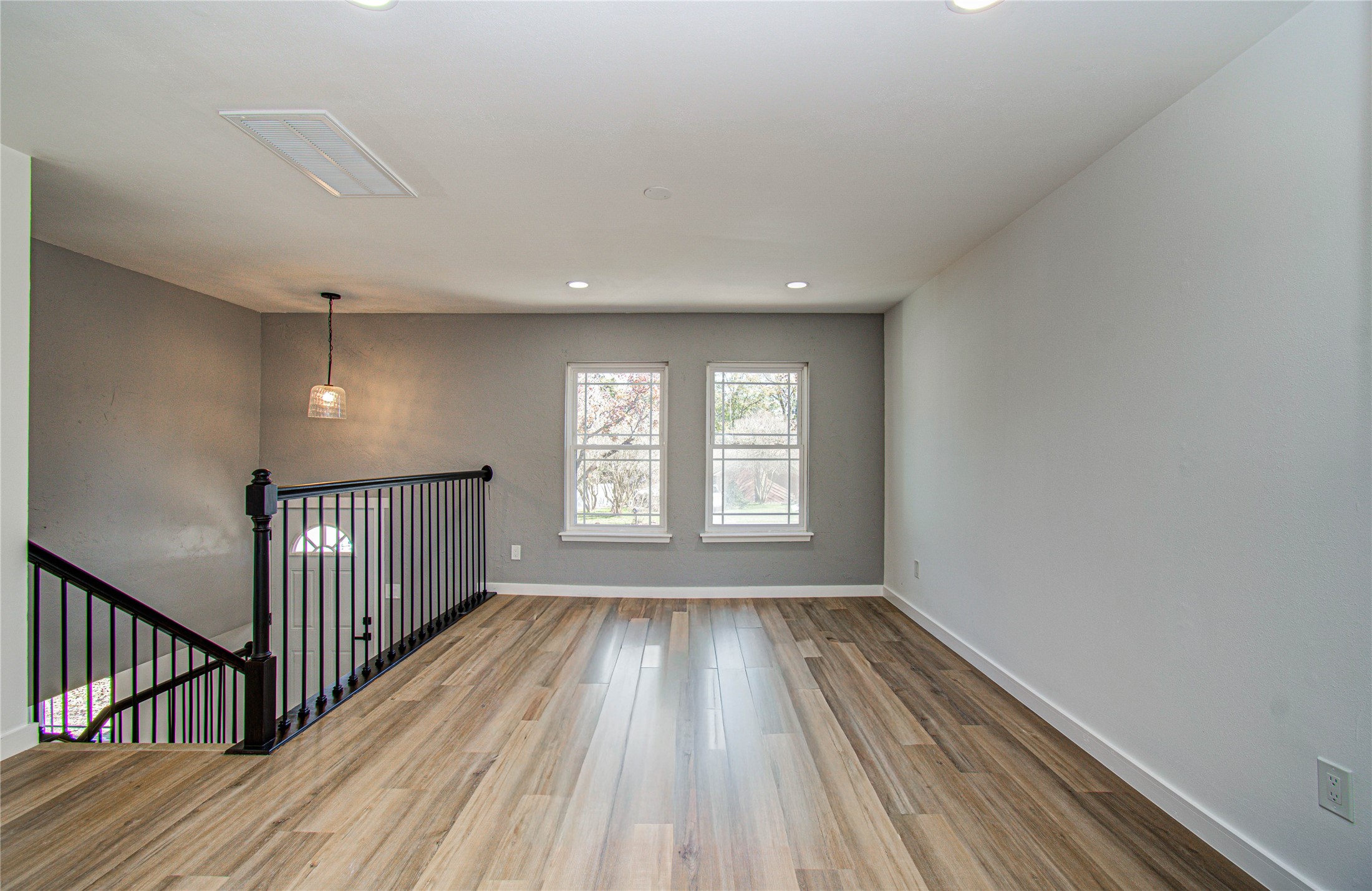 23319 Whispering Willow Drive Spring, TX 77373 - Photo 29 of 41 a view of wooden floor in a hall with a window