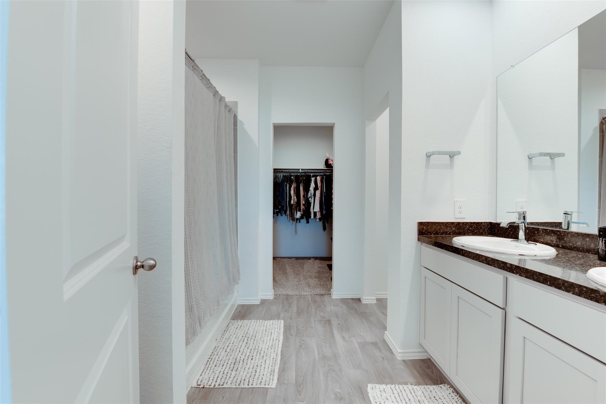 5339 Tuscany Hills Lane Spring, TX 77373 - Photo 16 of 28 a bathroom with a sink and mirror