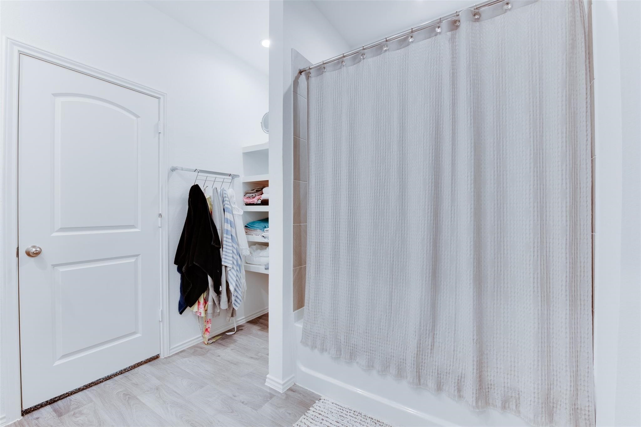 5339 Tuscany Hills Lane Spring, TX 77373 - Photo 17 of 28 a view of a closet with wooden floor