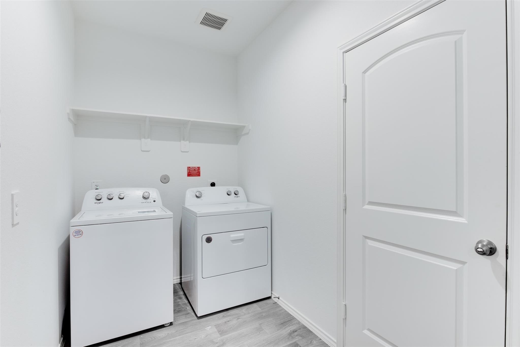 5339 Tuscany Hills Lane Spring, TX 77373 - Photo 19 of 28 a utility room with dryer and washer