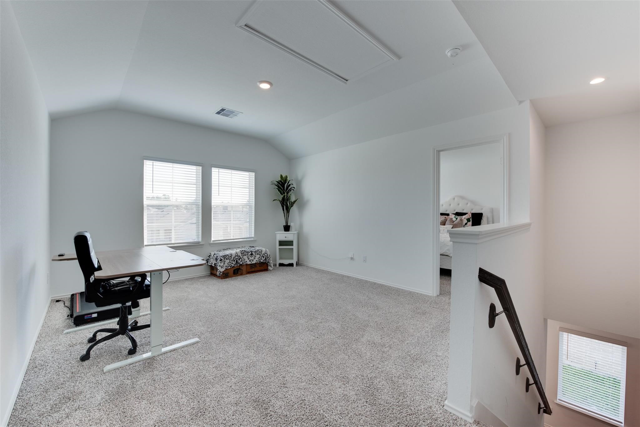 5339 Tuscany Hills Lane Spring, TX 77373 - Photo 21 of 28 a view of a workspace with furniture and a window