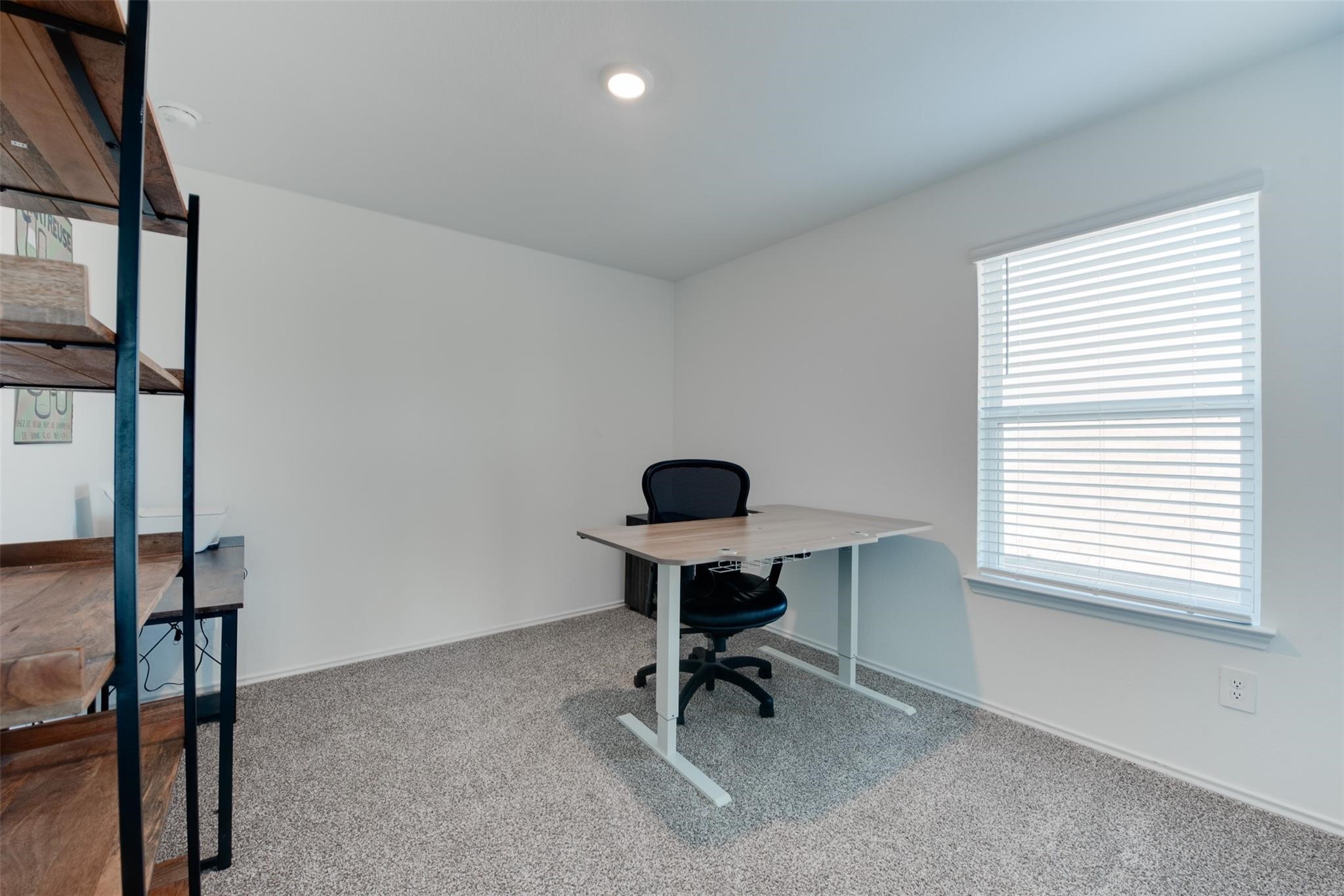 5339 Tuscany Hills Lane Spring, TX 77373 - Photo 26 of 28 a view of a workspace with a window
