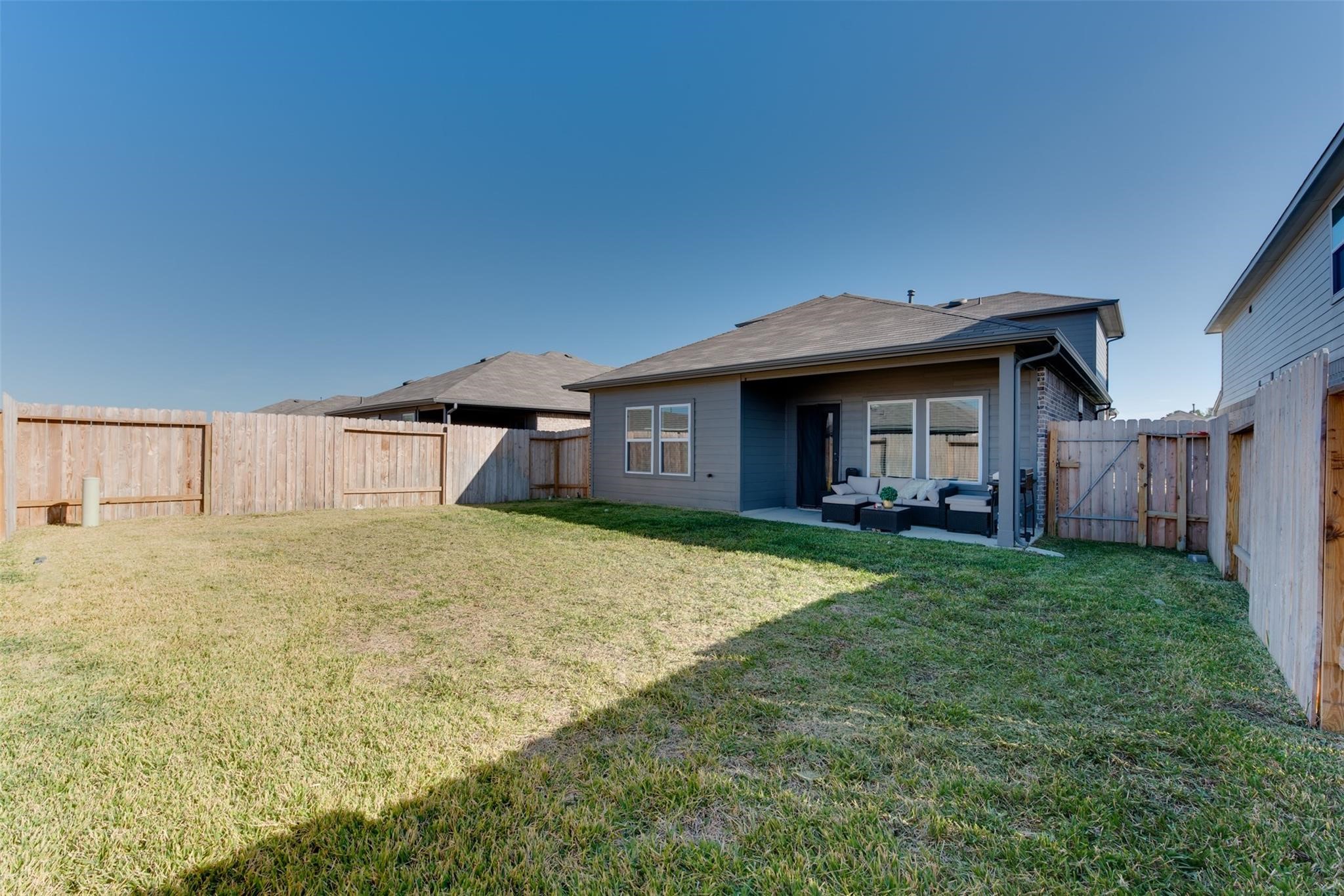5339 Tuscany Hills Lane Spring, TX 77373 - Photo 27 of 28 a view of a house with a yard