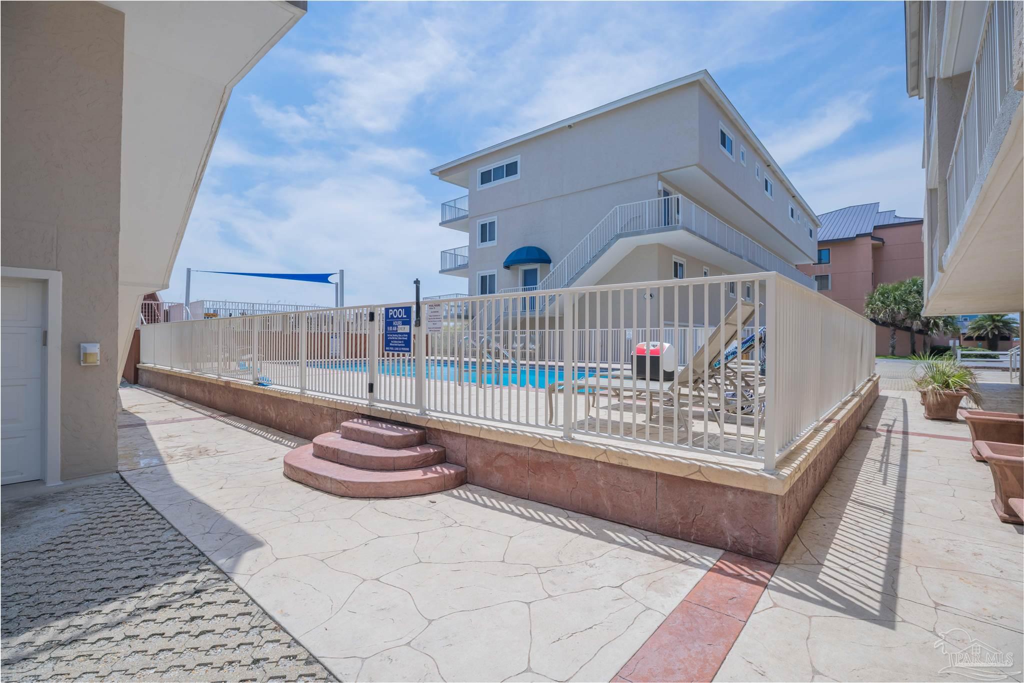 1111 Fort Pickens Road, Unit 312 Pensacola Beach, FL 32561 - Photo 33 of 40 a view of front door and deck