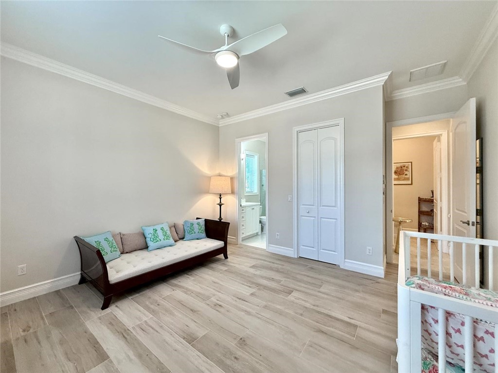506 Cypress Road Vero Beach, FL 32963 - Photo 20 of 35 a living room with furniture and a chandelier