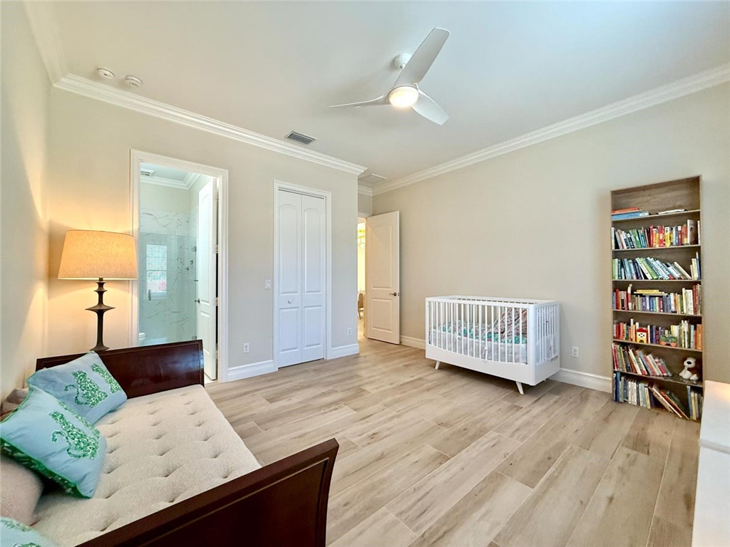 506 Cypress Road Vero Beach, FL 32963 - Photo 21 of 35 a living room with furniture and wooden floor