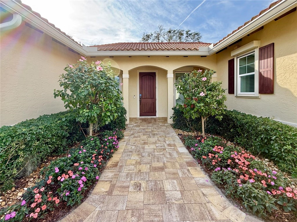 506 Cypress Road Vero Beach, FL 32963 - Photo 3 of 35 a front view of a house