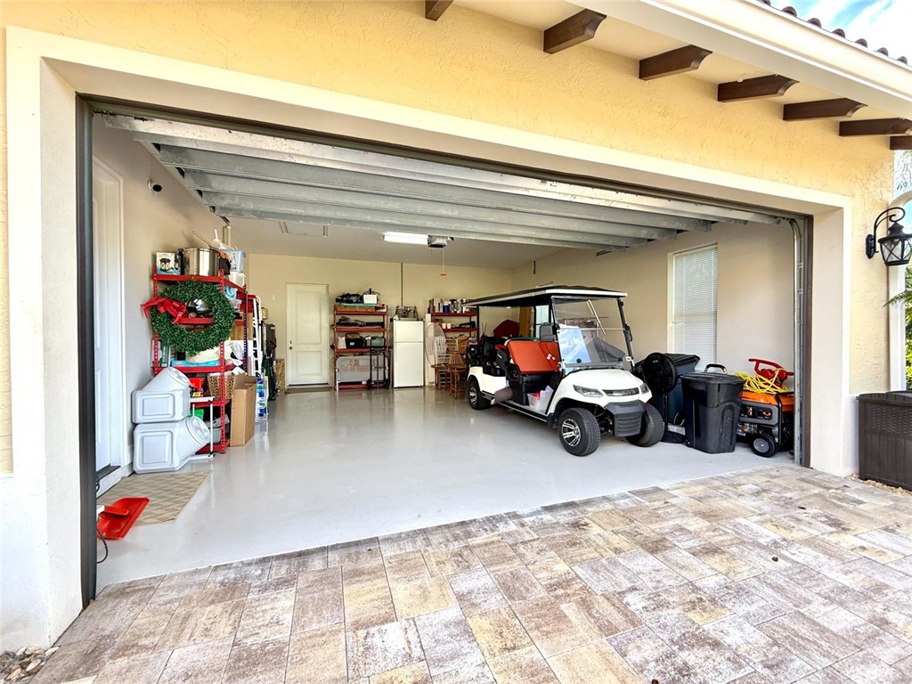 506 Cypress Road Vero Beach, FL 32963 - Photo 34 of 35 a view of a garage