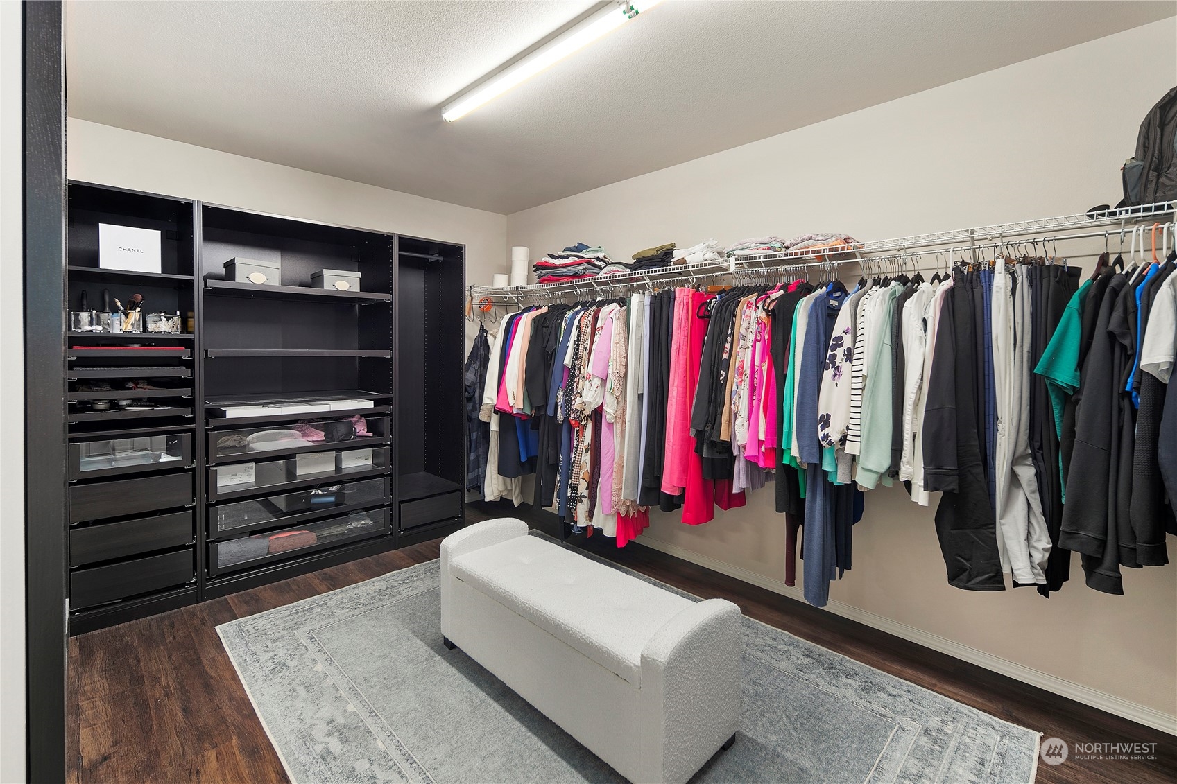 14501 Southeast 154th Street Renton, WA 98058 - Photo 23 of 36 a view of walk in closet with clothes and shoes