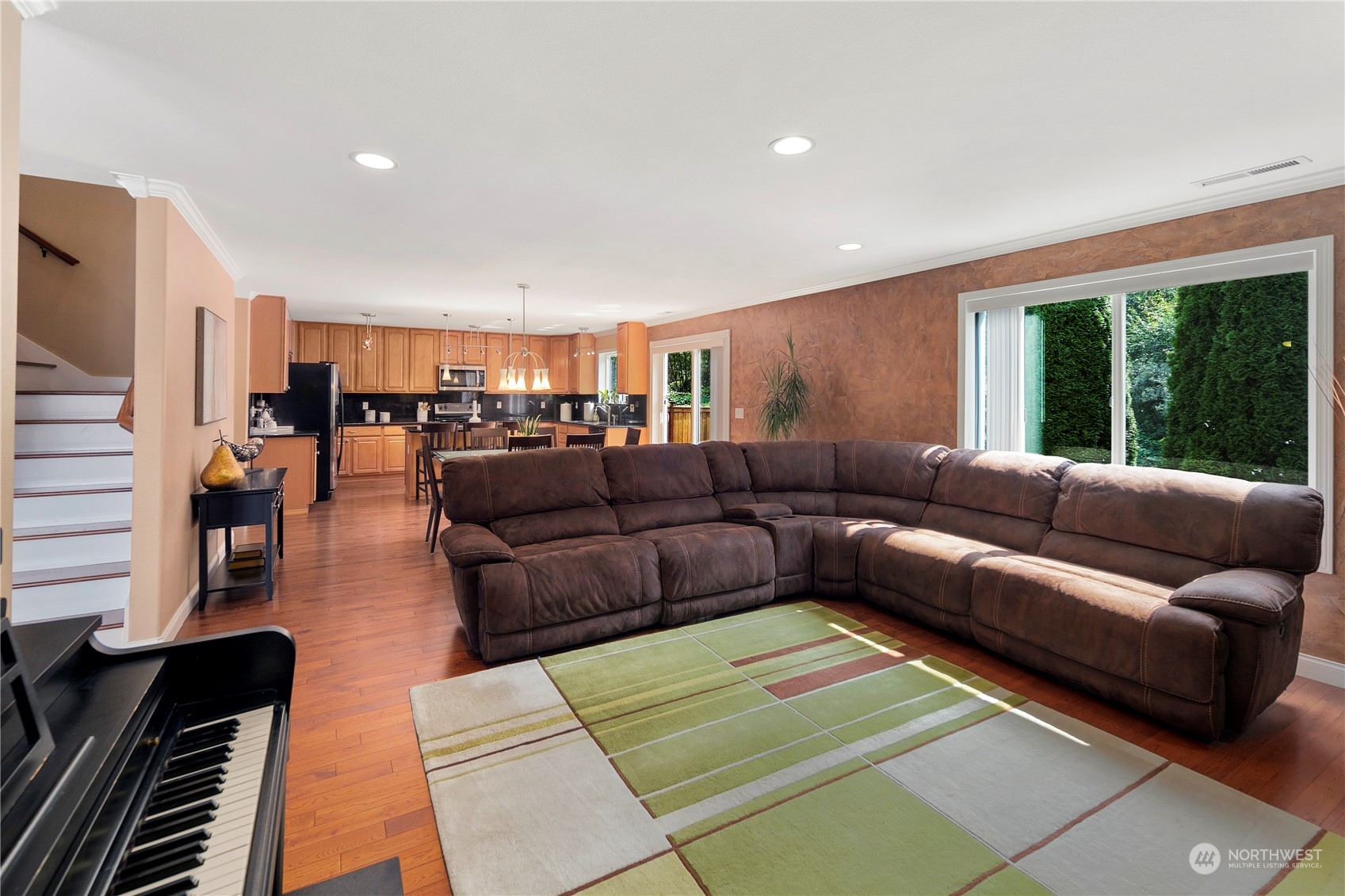 14501 Southeast 154th Street Renton, WA 98058 - Photo 8 of 36 a living room with furniture and a large window