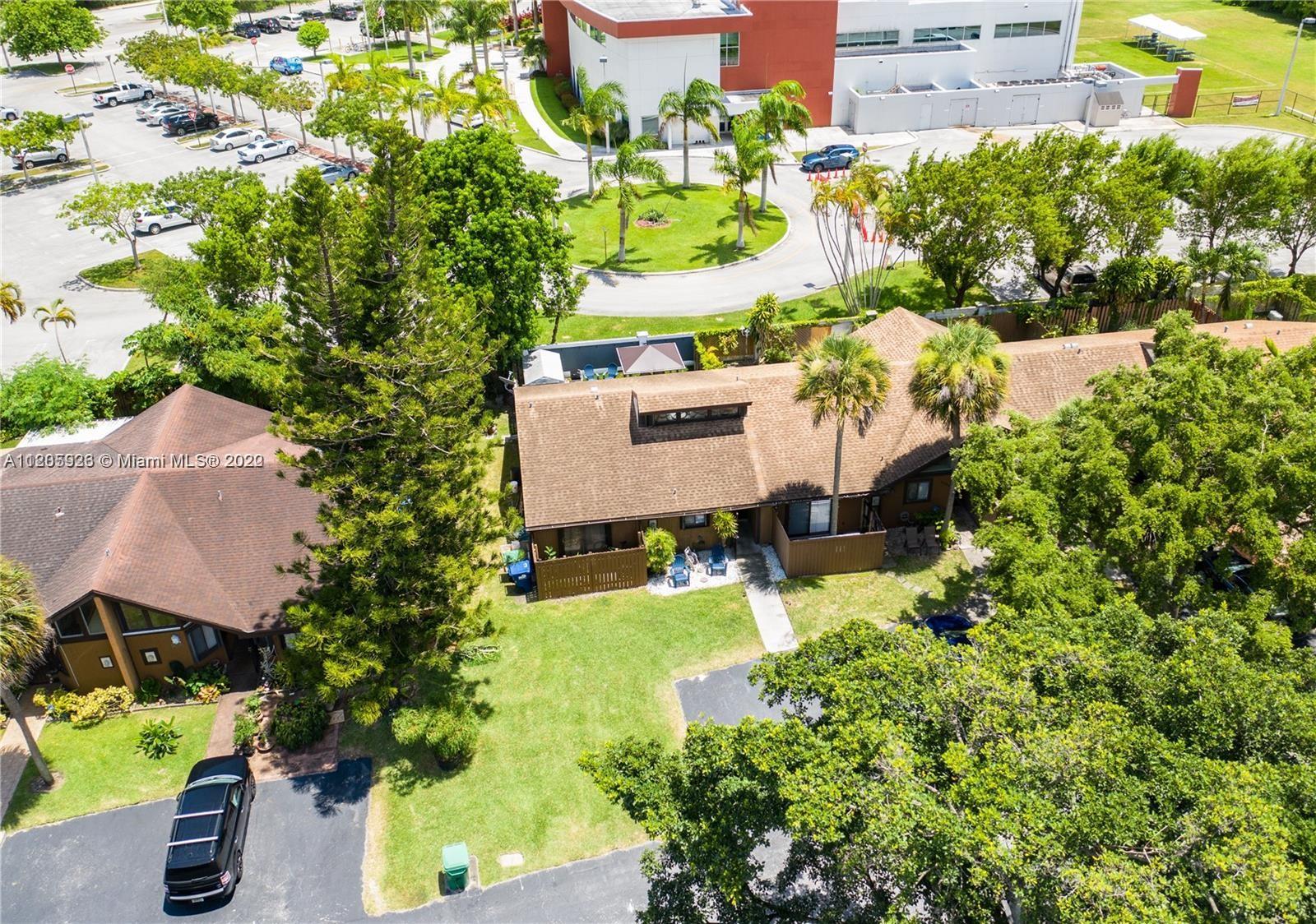 9300 Southwest 132nd Street, Unit 9300 Miami, FL 33176 - Photo 13 of 13 an aerial view of a house with a yard swimming pool and outdoor seating