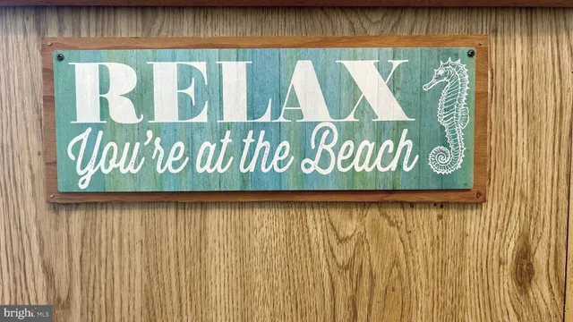 a sign on a wooden wall