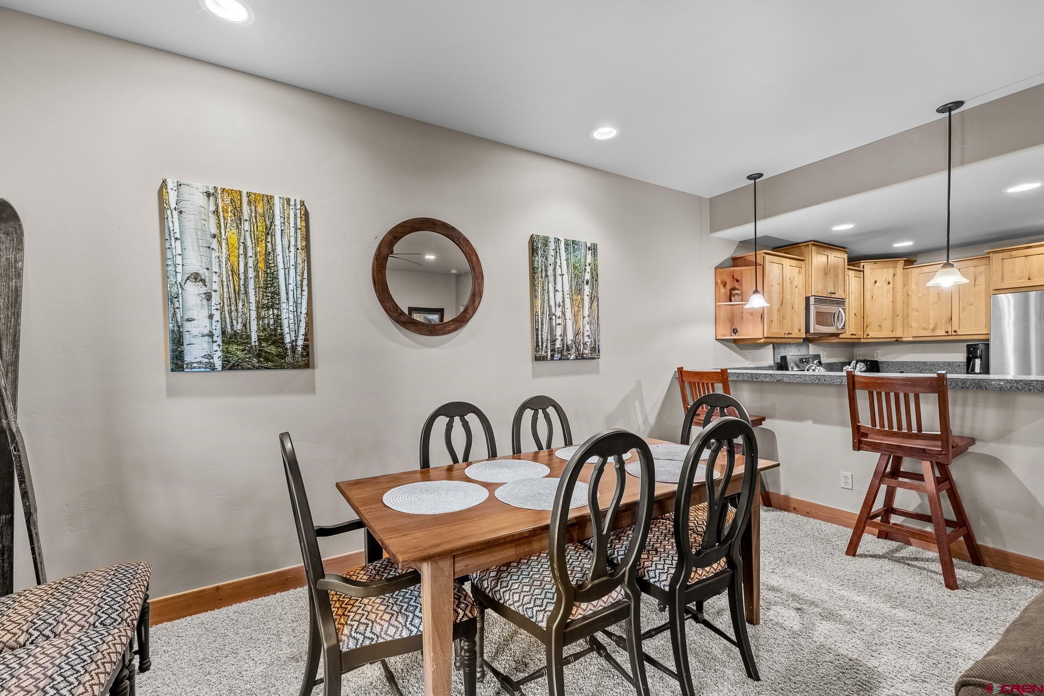 67 Travertine Trail Durango, CO 81301 - Photo 15 of 34 a view of a dining room with furniture