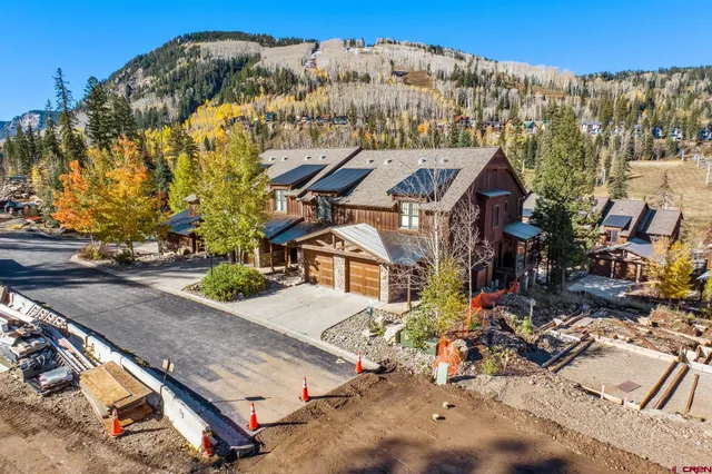 a view of a building with a door and a window