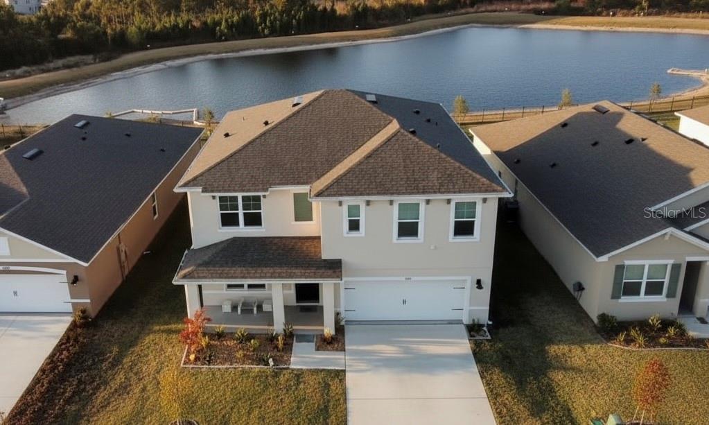 2731 House Finch Road Harmony, FL 34773 - Photo 1 of 95 an aerial view of a house with swimming pool