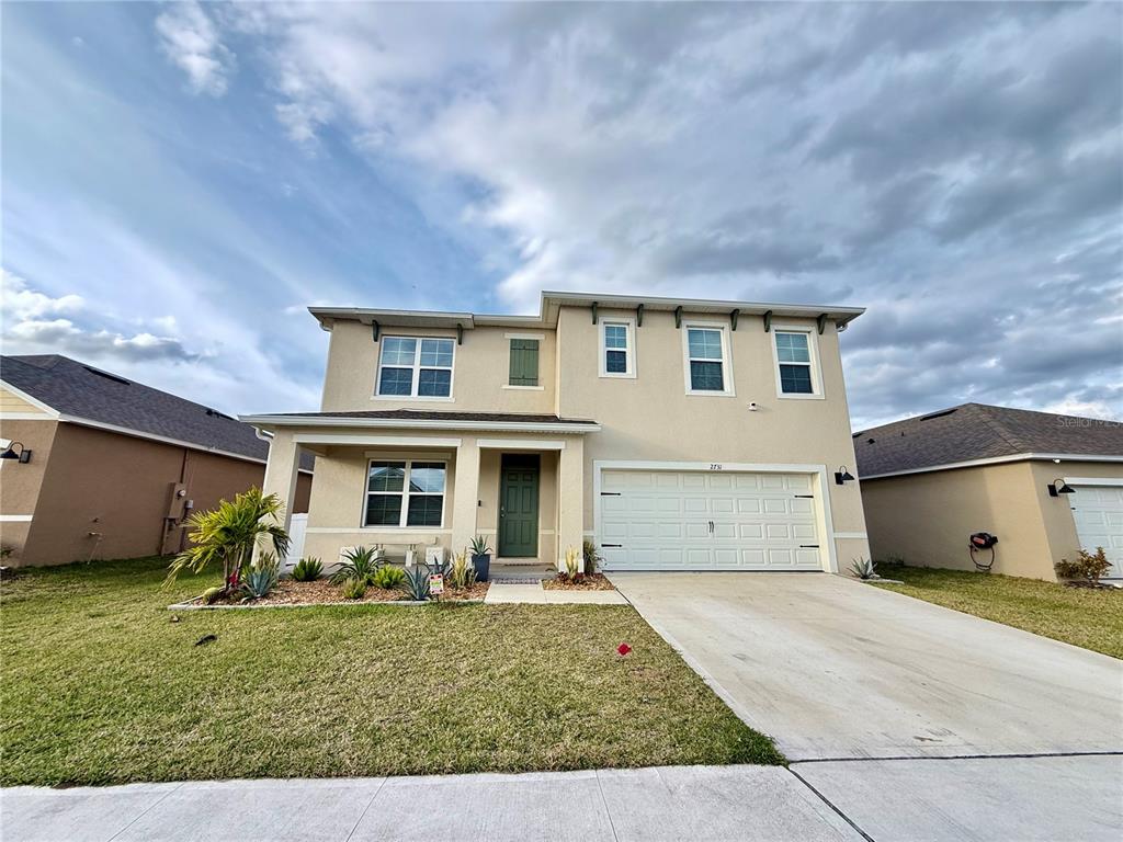2731 House Finch Road Harmony, FL 34773 - Photo 6 of 95 a view of a yard in front of house