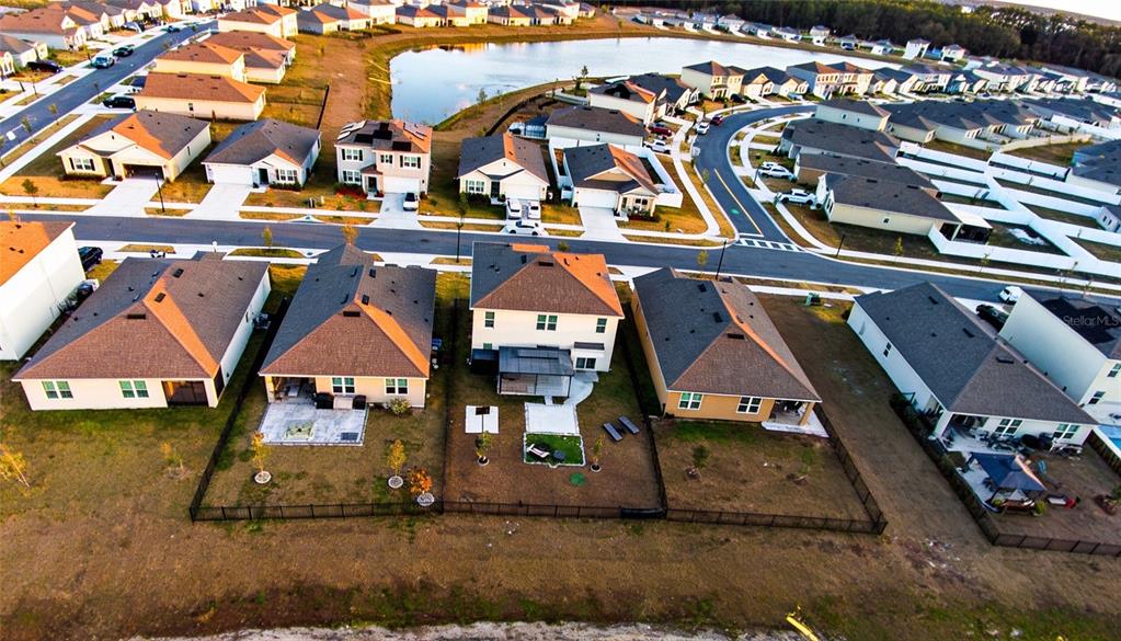 2731 House Finch Road Harmony, FL 34773 - Photo 67 of 95 an aerial view of residential houses with outdoor space