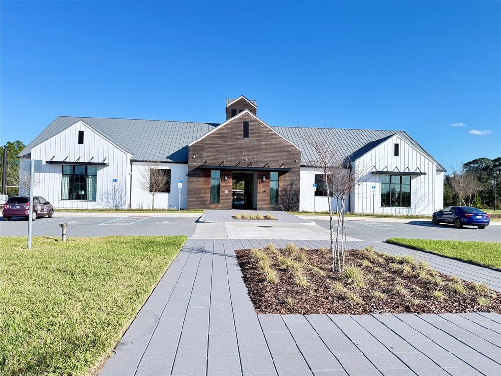 2731 House Finch Road Harmony, FL 34773 - Photo 75 of 95 a front view of a house with a yard