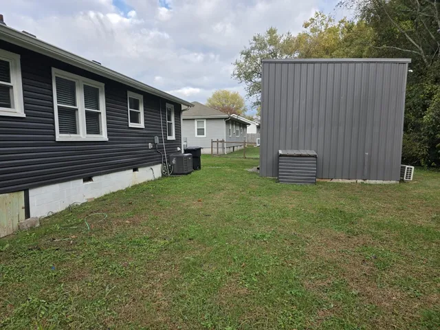 a view of outdoor space with deck and backyard