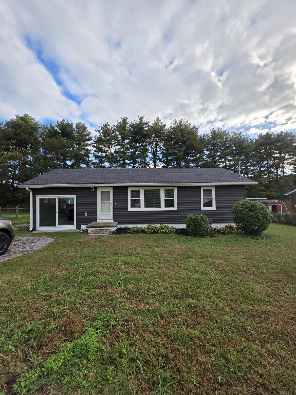 602 Johnson Street Murfreesboro, TN 37130 - Photo 26 of 28 a view of a yard in front of a house with large trees