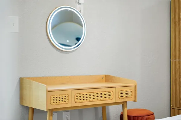 a view of a garden with large trees