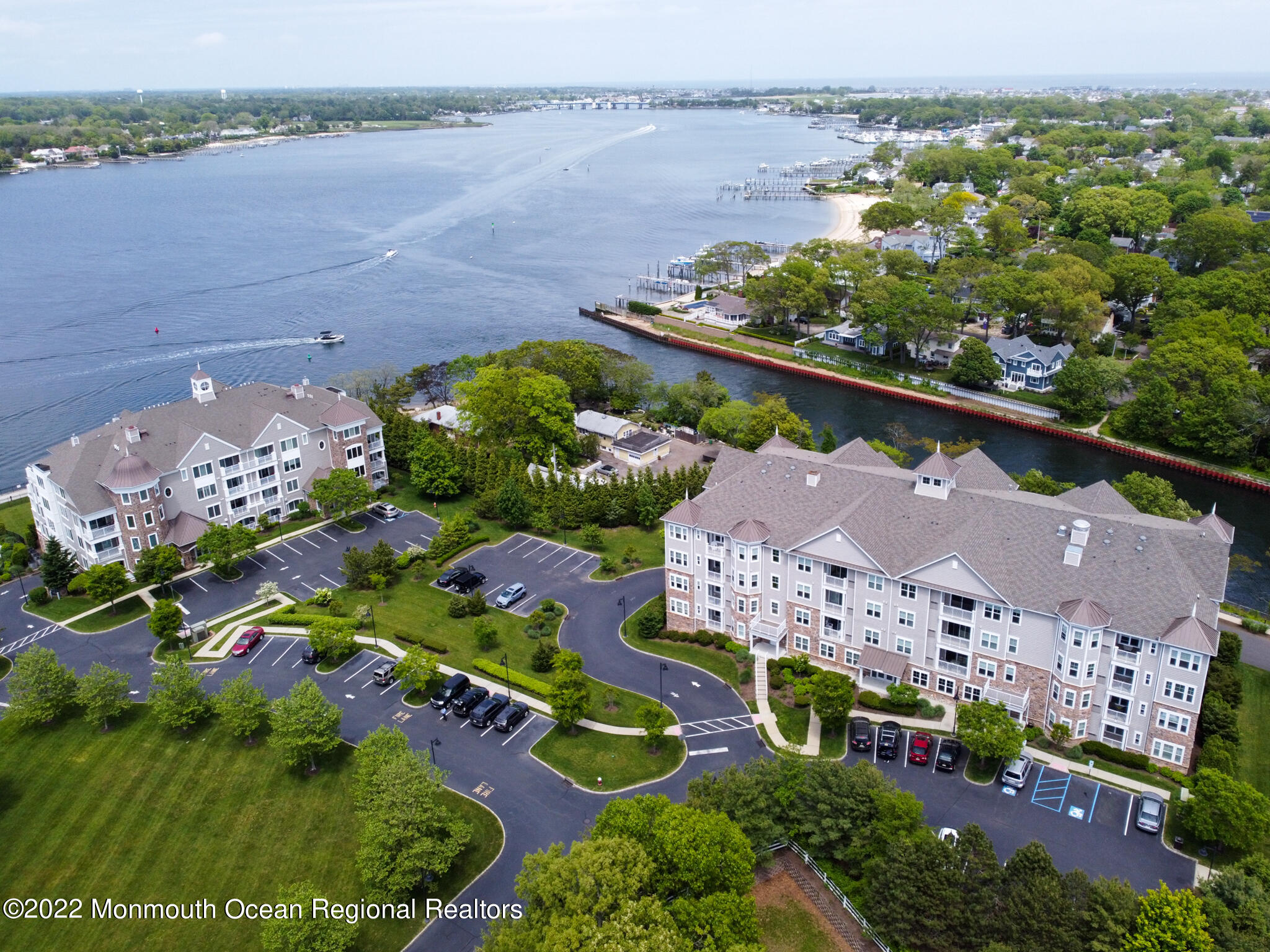 2201 River Road, Unit 4203 Point Pleasant, NJ 08742 - Photo 3 of 30 a view of a lake with a mountain in the background