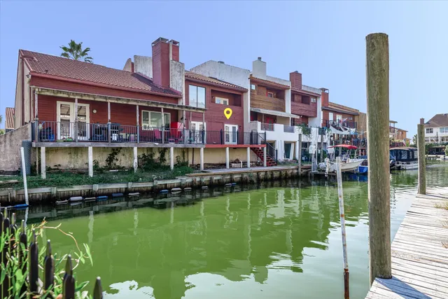 a view of a house with a wooden floor and city view