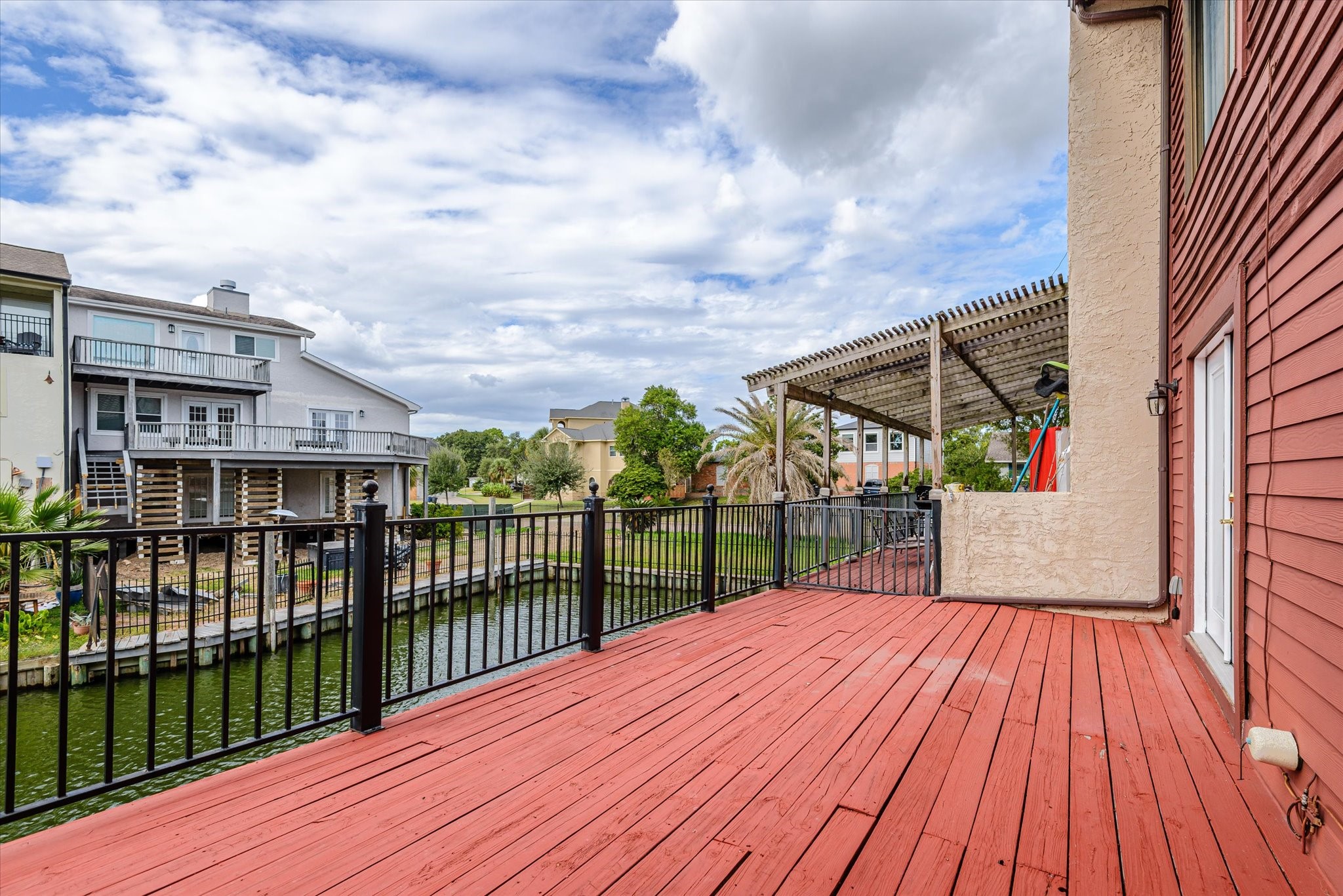 18 Antilles Lane Nassau Bay, TX 77058 - Photo 35 of 44 a view of a house with a wooden floor and city view